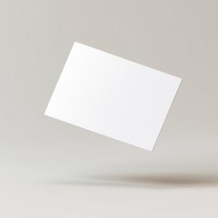 business card mockup concept. A floating blank card against a soft gray background, ideal for mockups and design presentations.