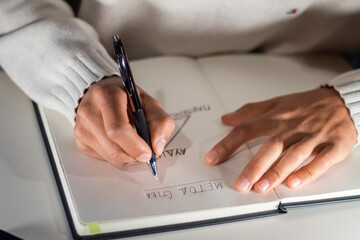 business person writing 