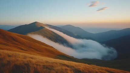 Sunset mountain range, fog valley, golden grass, peaceful landscape, nature photography