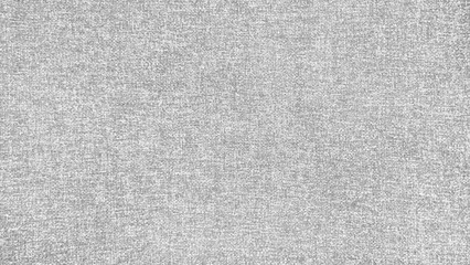 close-up view of a gray fabric with a textured weave, offering a subtle, yet elegant background option for design projects. grey upholstery fabric use as background with blank space for design.