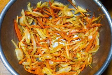 stir-fried the slices of onion and carrot