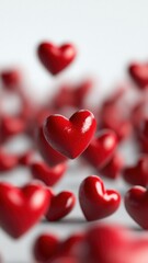 3d red hearts drifting valentine against pristine white background, symbolizing romantic sentiment, perfect for love related design concepts. Vertical format
