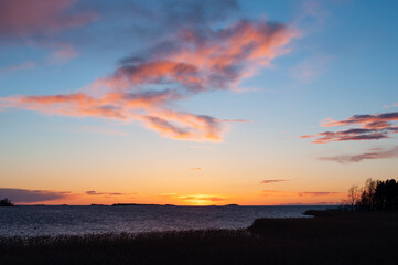 Early morning clouds at sunset time in spring in Pori, Finland
