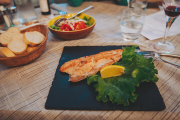 Grilled snapper fish steak with vagetable. Photo of food.