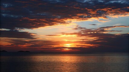 Obraz premium Calm Blue Sea During Golden Hour