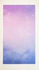 Purple and blue nebula painting created with spray paint, featuring white specks resembling stars, displayed on a canvas, perfect for backgrounds and artistic projects