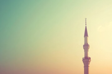 Elegant Minaret Silhouette Against Dreamy Pastel Sky at Sunset - Architectural Beauty of Mosque in Soft Lighting with Ethereal Atmosphere