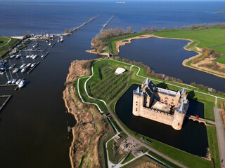 Obraz premium Aerial view of the castle of Muiden and the Muiderlake in the background, The Netherlands