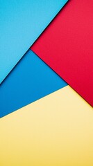 Geometric composition featuring overlapping sheets of blue, red, and yellow paper, creating a visually appealing abstract design with vibrant colors