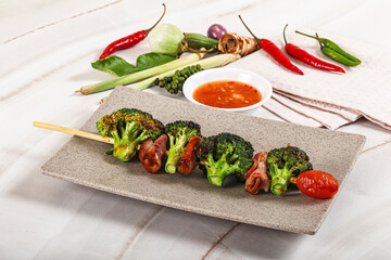 Thai Street foof satay with bacon and broccoli