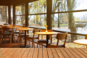 Empty wooden table in restaurant, space for design