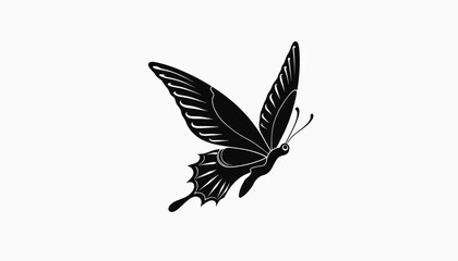 Obraz premium Black butterfly flying gracefully against a plain background, freedom