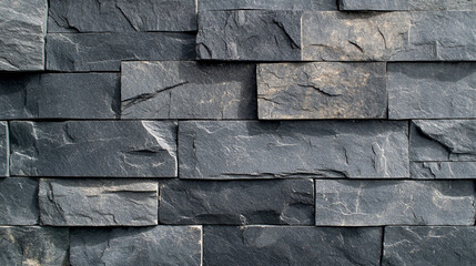 Dark gray stone wall texture background. Background bricks for loft decor interior with space for text