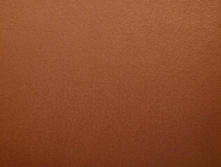 Vintage fiber texture and a warm, earthy tone characterize this mocha mousse paper background. Matte in rust