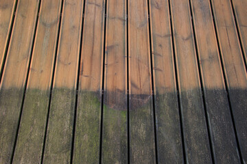Weathered mossy pine wood boards before and after cleaning