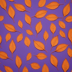 Obraz premium Pattern of dry orange metallic leaves on violet background