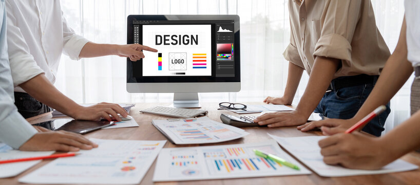 Graphic designer software for modern design of web page and commercial brisk ads showing on the computer screen