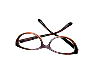 Pair of cat eye shape glasses wth a brown frame on a transparent background