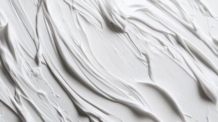 Obraz premium Textured white paint or plaster surface with smooth, flowing strokes creating a pattern background with Copy Space.