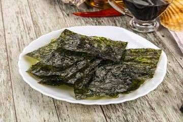 Green nori seaweed chips with soya sauce