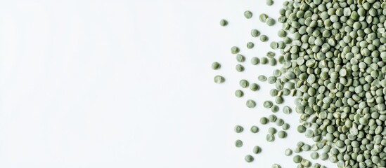 Green pea seeds Vigna radiata on white background showcasing split peas with ample copy space for text in a top view arrangement