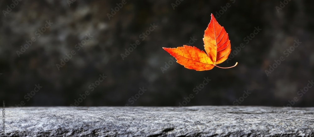Poster vibrant autumn leaves falling against a dark background with space for text or graphics
