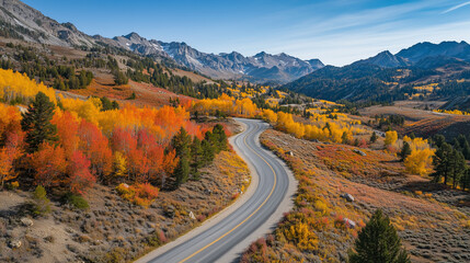 Scenic Winding Road Through Vibrant Autumn Mountains &ndash; Aerial Fall Foliage Landscape