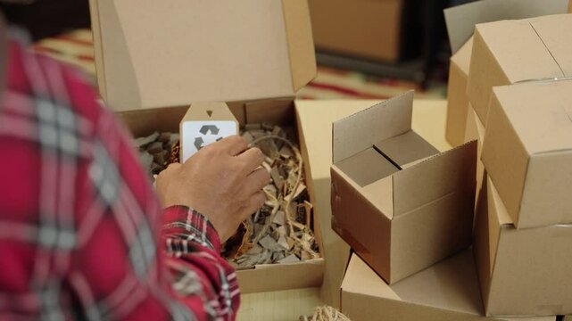 Recyclable packaging for eco-conscious home business. Sustainable materials promoting plastic-free solutions and alternative packaging. Eco packaging, recyclable, green business, sustainable