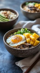 Quinoa with saut&eacute;ed mushrooms and a sunny-side-up quail egg. Oatmeal topped with mango chunks and a sprinkle of chia seeds. Steamed rice with creamy avocado slices and a drizzle of soy sauce
