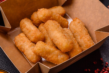 Delicious crispy cheese sticks with mozzarella, salt and spices