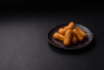 Delicious crispy cheese sticks with mozzarella, salt and spices
