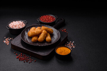 Delicious crispy cheese sticks with mozzarella, salt and spices