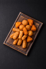 Delicious crispy cheese sticks with mozzarella, salt and spices