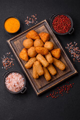 Delicious crispy cheese sticks with mozzarella, salt and spices
