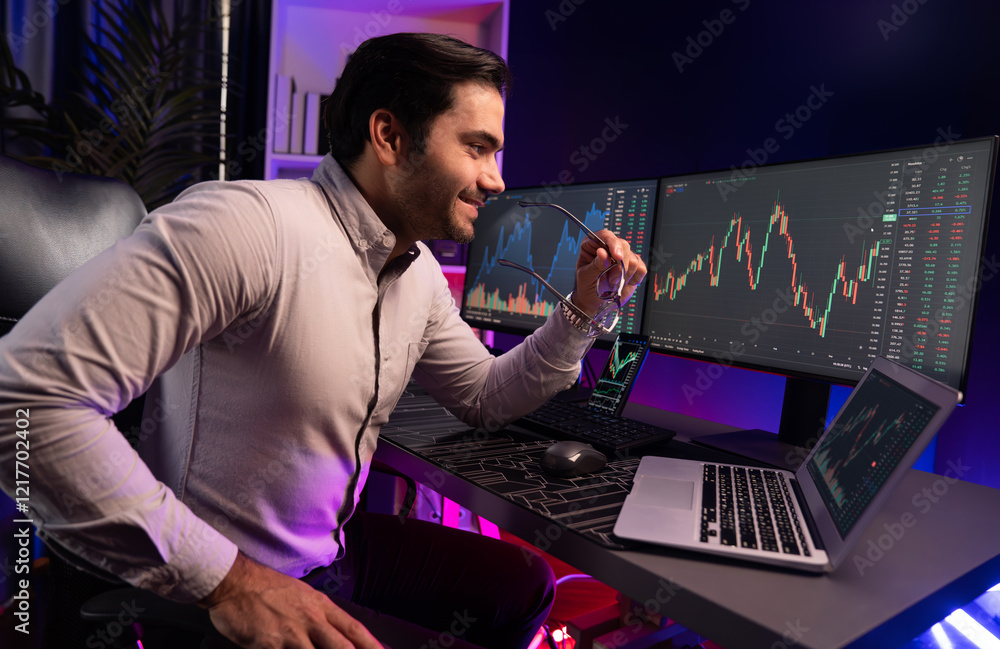 Poster smart trader businessman concentrating on dynamic stock exchange investment on pc and laptop showing