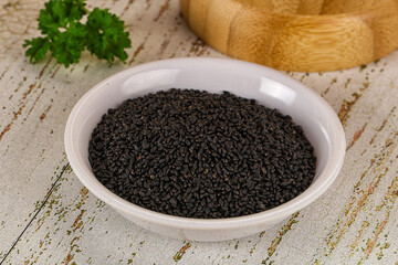 Black dry Nigella seeds in the bowl