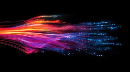 A vibrant display of flowing light strands in hues of blue, pink, and orange against a black background, creating a dynamic and energetic visual effect.