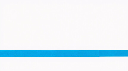 Obraz premium Single Blue Tape Strip on White Background