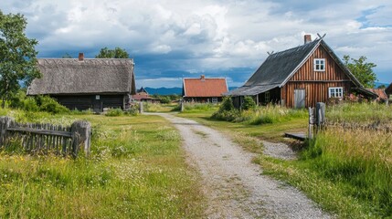 Obraz premium Rural village path, historic homes, cloudy sky, tourism