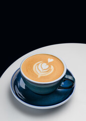 cup with fresh coffee drink and delicate foam with a pattern. Cafe and restaurant menu. Coffee shop. Copy space