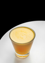 pumpkin latte in a glass cup. Menu for cafes, restaurants. Black background. Space for text
