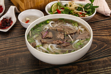 Vietnamese Pho Bo soup with beef and noodles