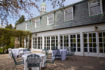 The outdoor patio with dining tables in autumn