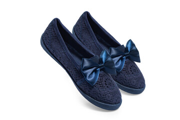 Navy blue girls' ballerinas with bow on white background