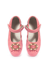 Pink leather girls' ballerinas with bow on white background