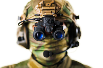 Tactical soldier with night vision goggles and military headset