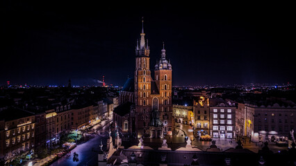 Naklejka premium city at night, church in Krakow, old square