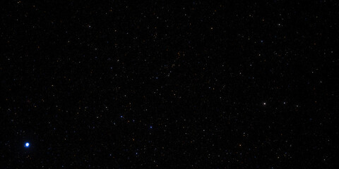 Night sky with countless stars against a deep black background