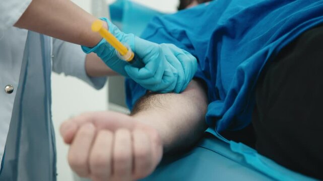 In a modern diagnostic center, a doctor prepares the patient for a CT or MRI scan by administering a contrast agent. The concept of advanced diagnostic methods and a personalized approach.