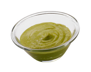 Guacamole sauce in a glass bowl isolated on transparent layered background.